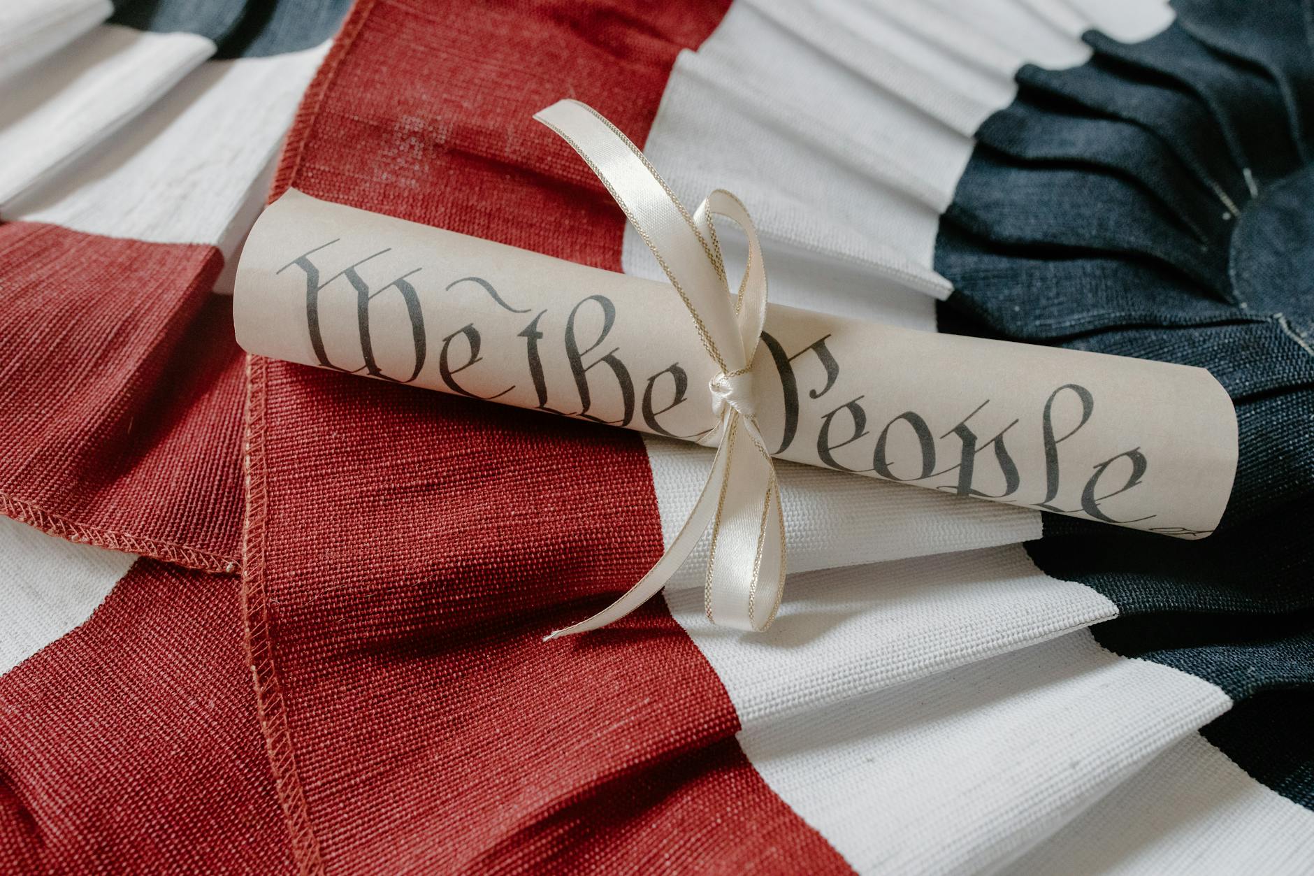document with ribbon on confederates banner