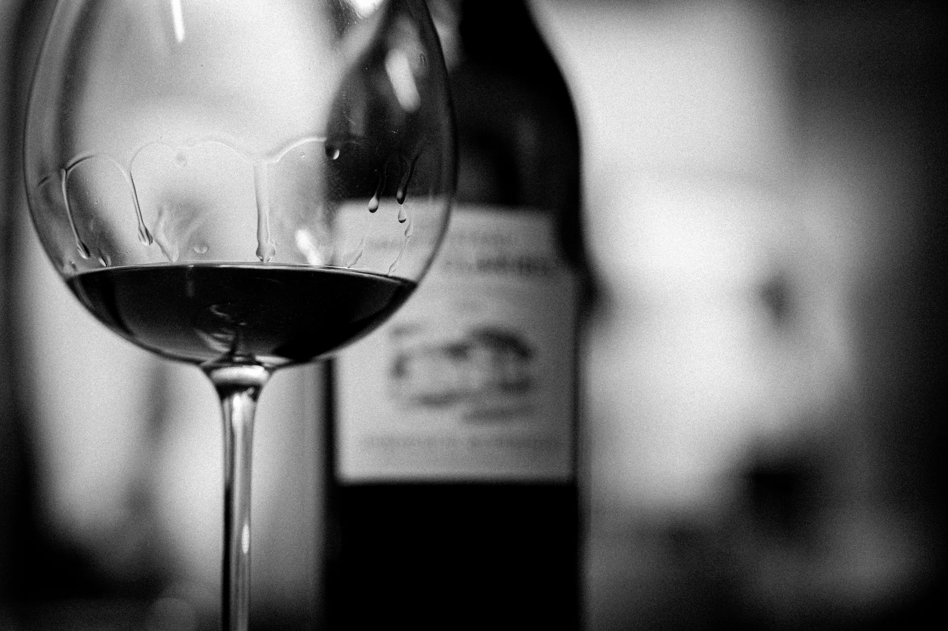 elegant black and white wine glass and bottle